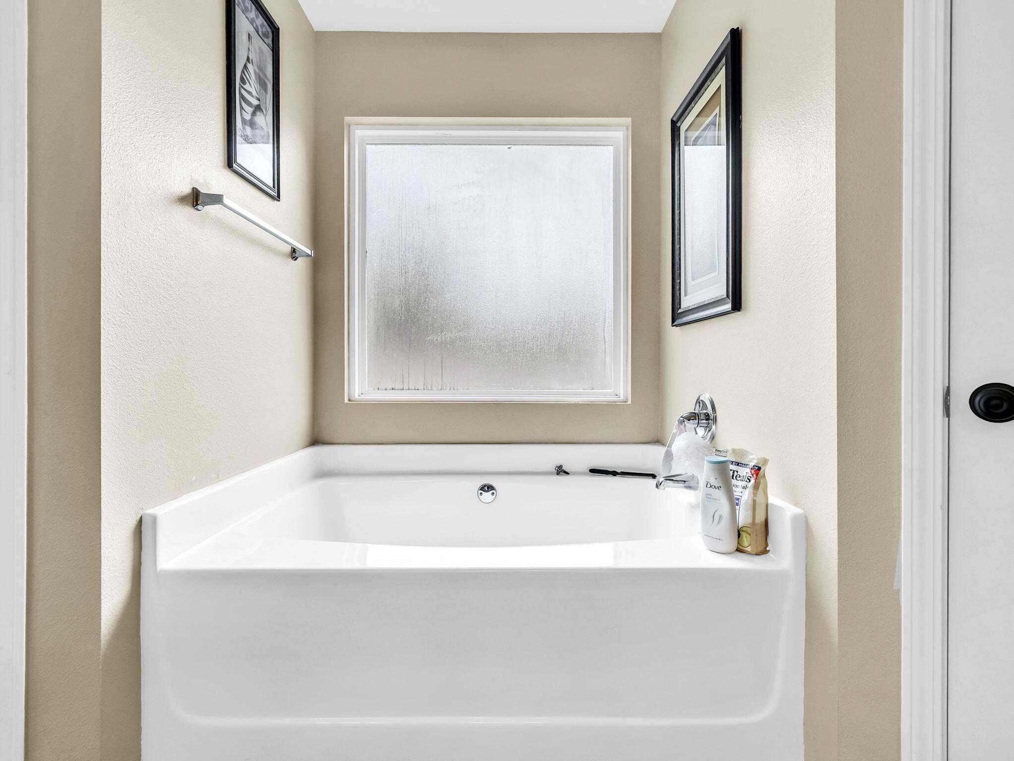 9119 Timber Lane Navarre, FL 32566 - Photo 35 of 53 a white bath tub sitting next to a white sink