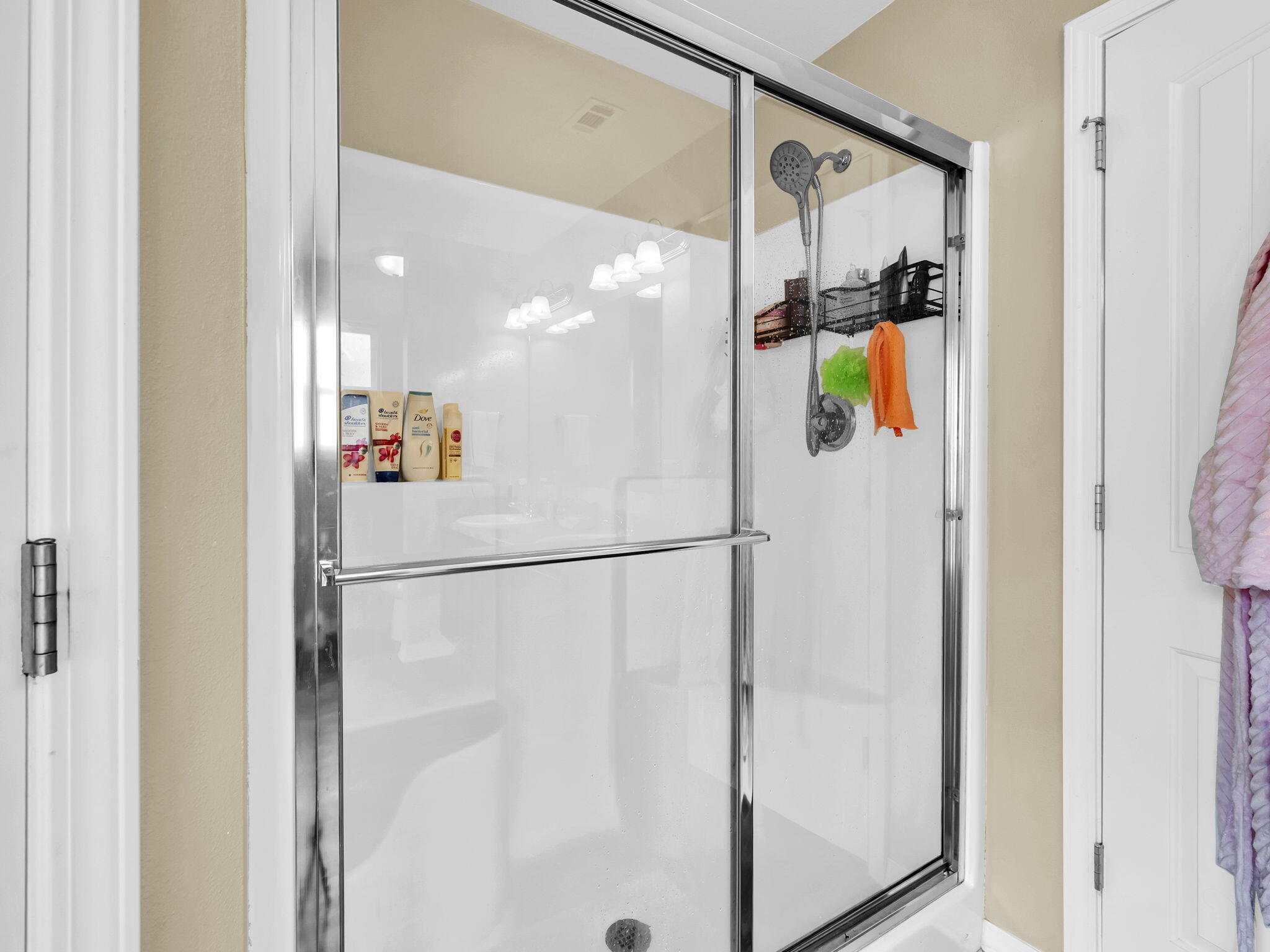 9119 Timber Lane Navarre, FL 32566 - Photo 36 of 53 a bathroom with a shower and a mirror