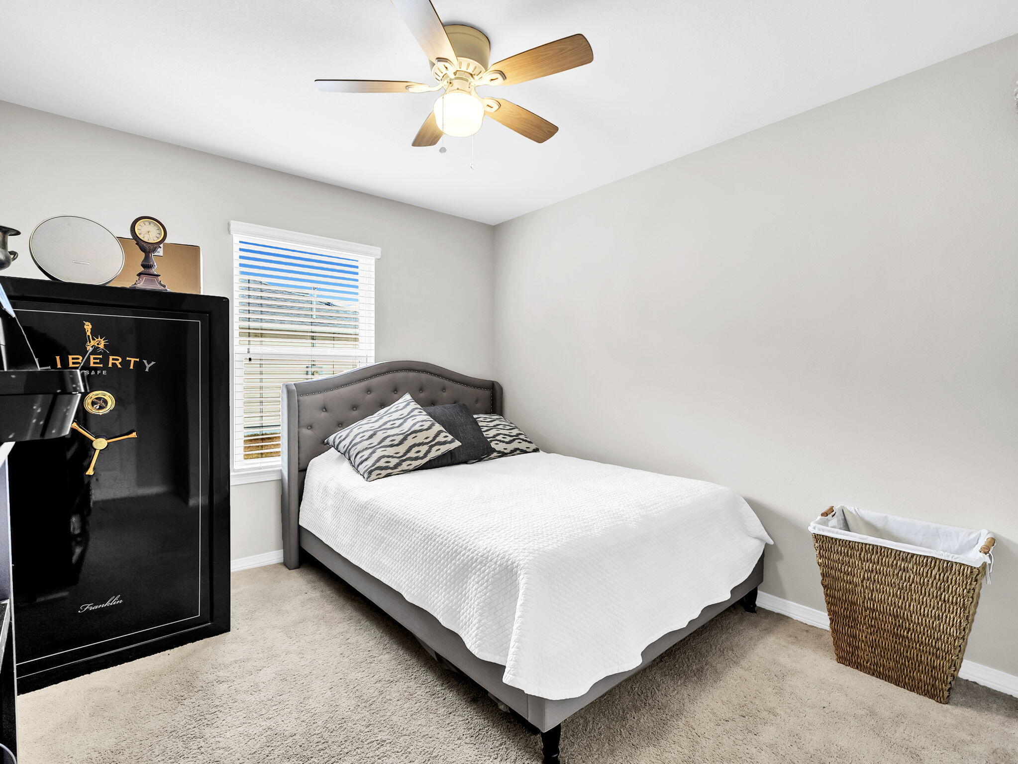 9119 Timber Lane Navarre, FL 32566 - Photo 37 of 53 a bedroom with a bed and dresser