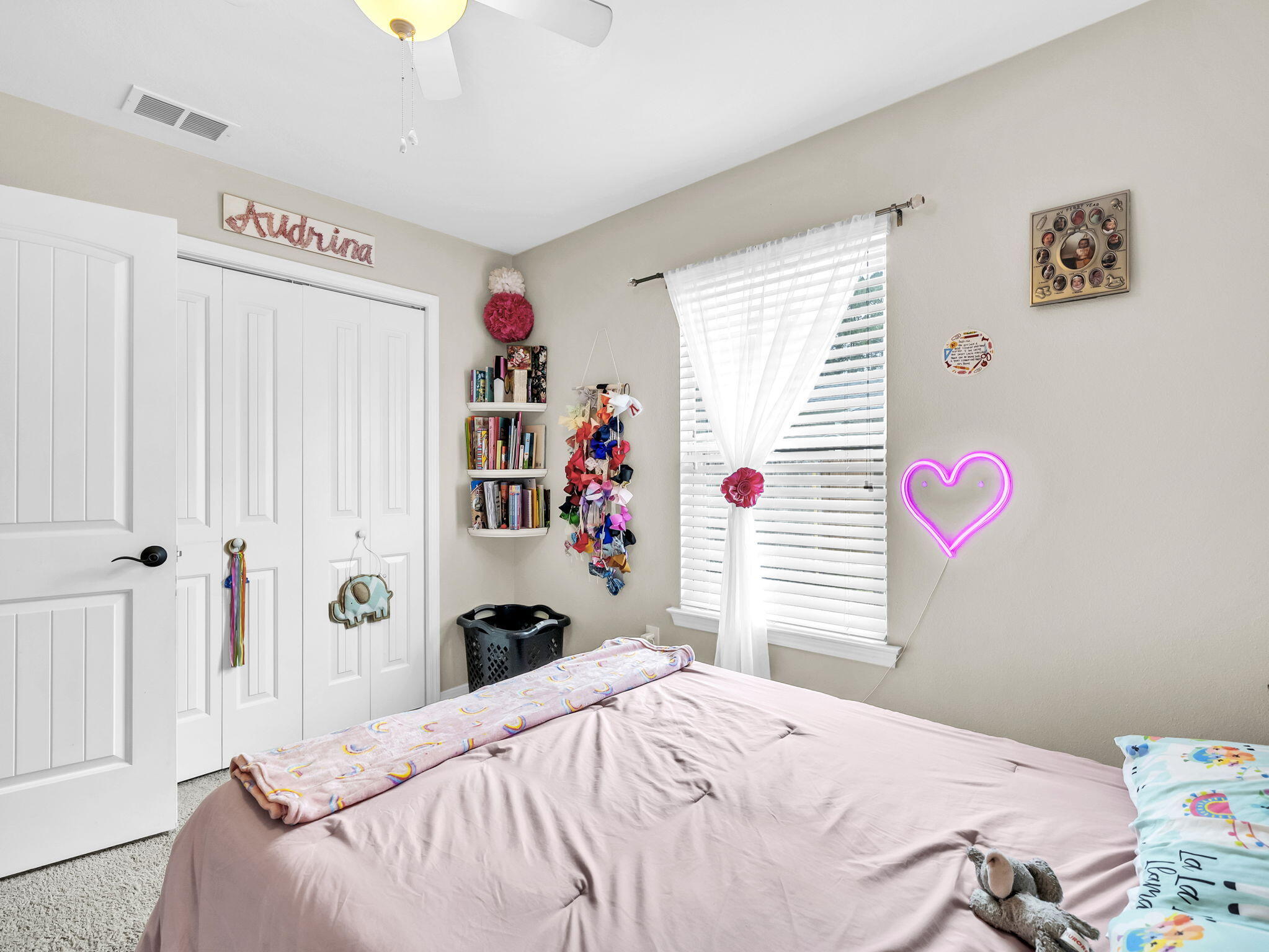 9119 Timber Lane Navarre, FL 32566 - Photo 40 of 53 a bedroom with a bed and a window