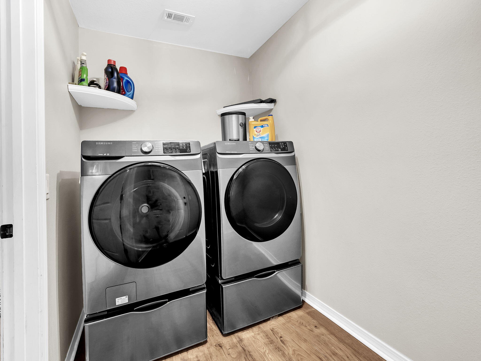 9119 Timber Lane Navarre, FL 32566 - Photo 44 of 53 a view of a hallway with washer and dryer