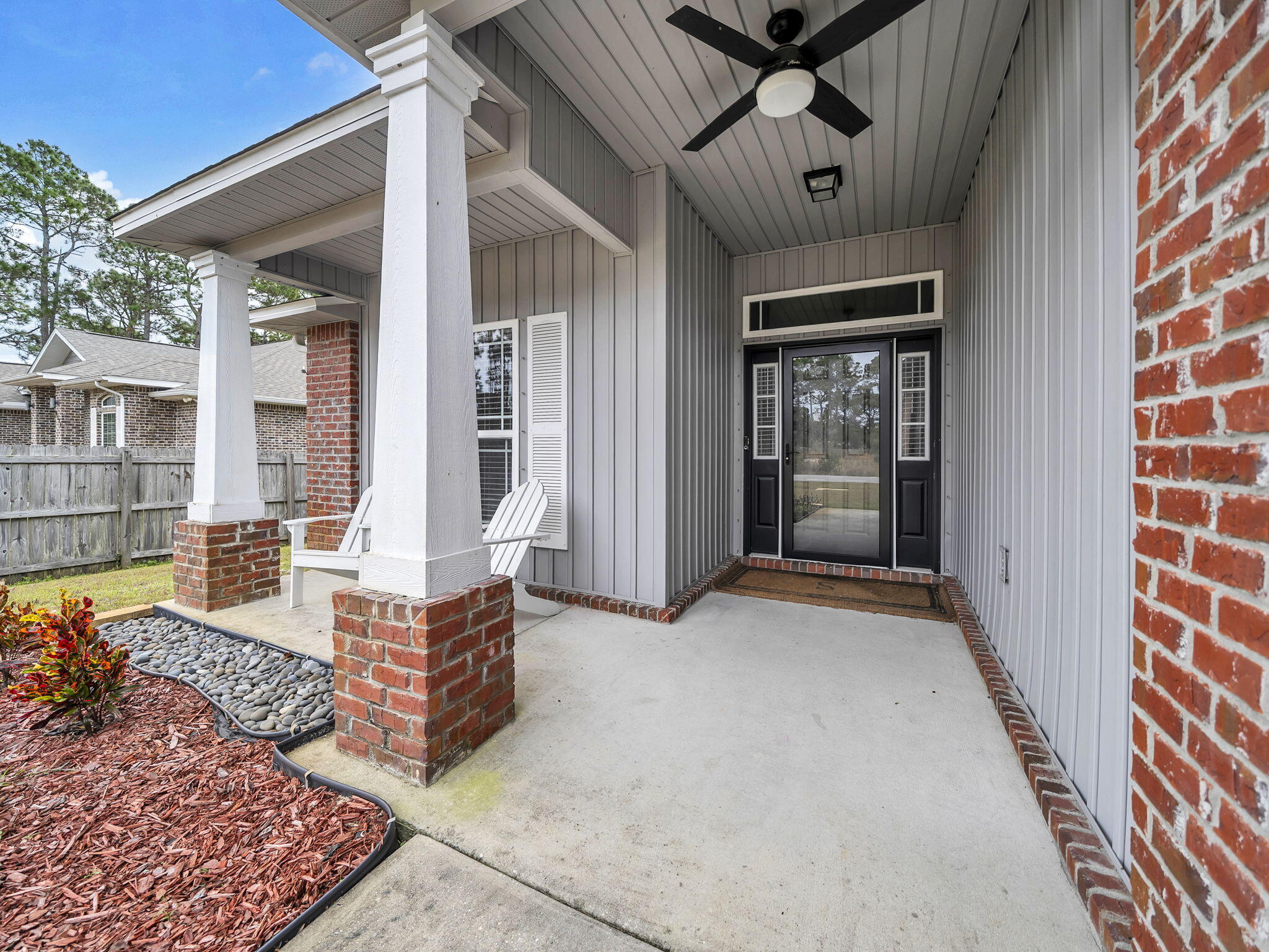 9119 Timber Lane Navarre, FL 32566 - Photo 6 of 53 a view of front door with couch