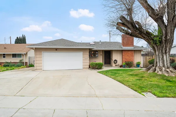 a front view of house with yard