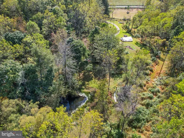 an empty room with a empty space and windows