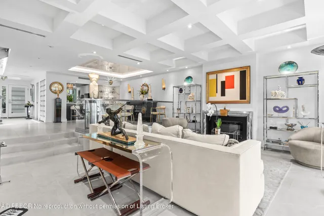 a kitchen with stainless steel appliances a stove a sink and a refrigerator