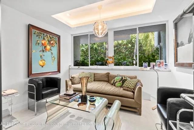 a view of a chairs and table in a patio