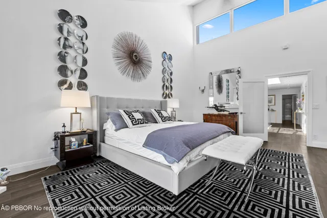 a bathroom with a shower and a glass door