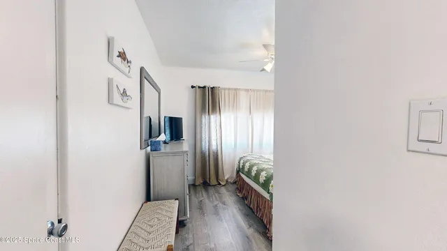 a view of a patio with a table and chairs