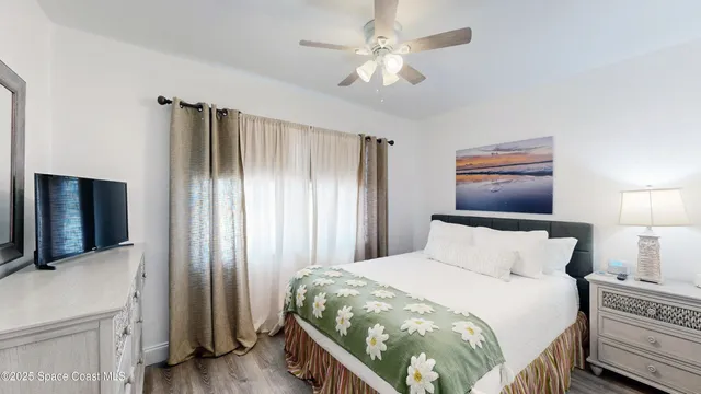 a front view of a house with a yard and a garage