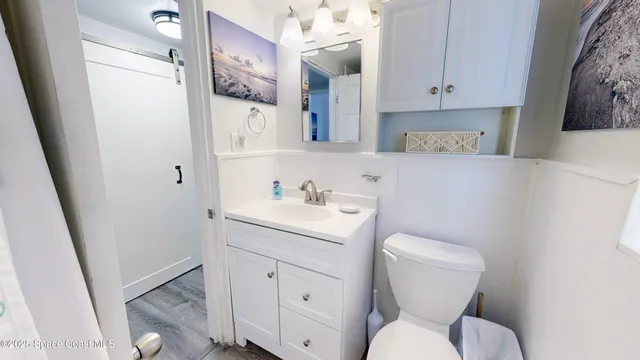 a kitchen with stainless steel appliances kitchen island granite countertop a stove and a sink