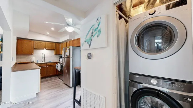 a bathroom with a sink a mirror and a shower curtain