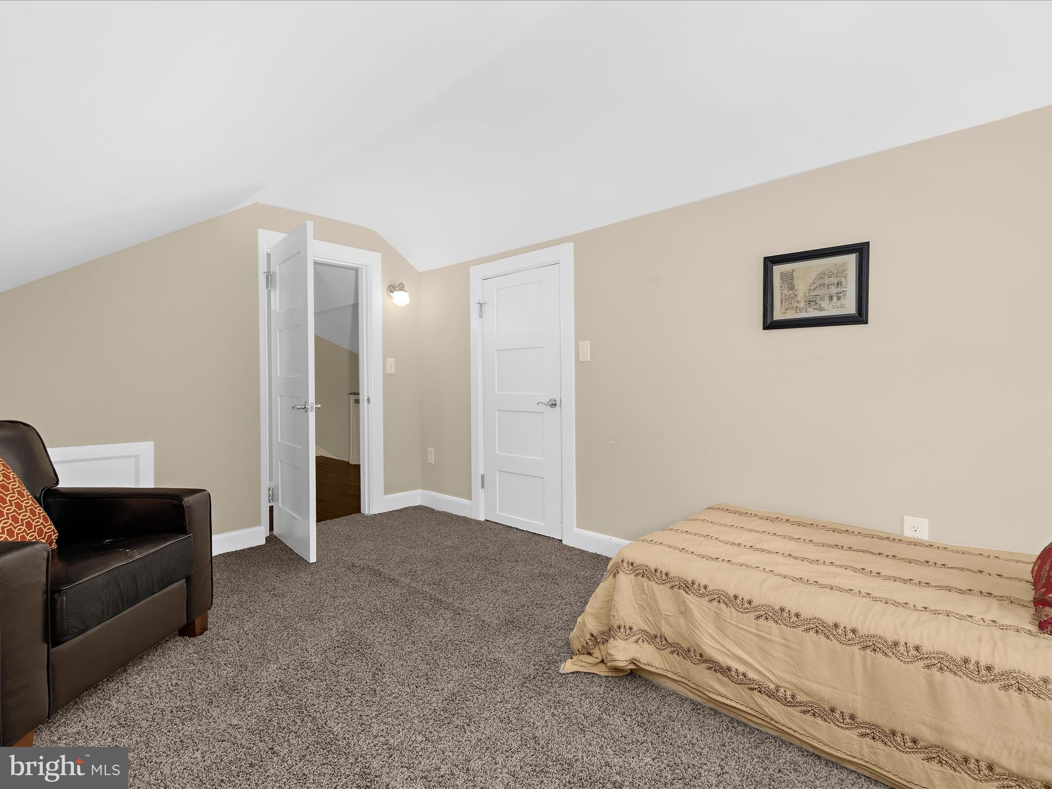 16 Elmwood Road Baltimore, MD 21210 - Photo 54 of 79 a bedroom with a bed and a couch