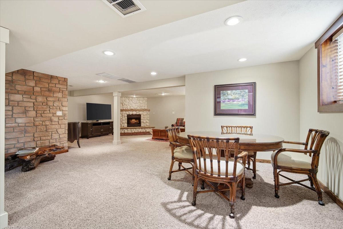203 Highview Drive Eureka, IL 61530 - Photo 28 of 49 a view of a livingroom with furniture and a flat screen tv