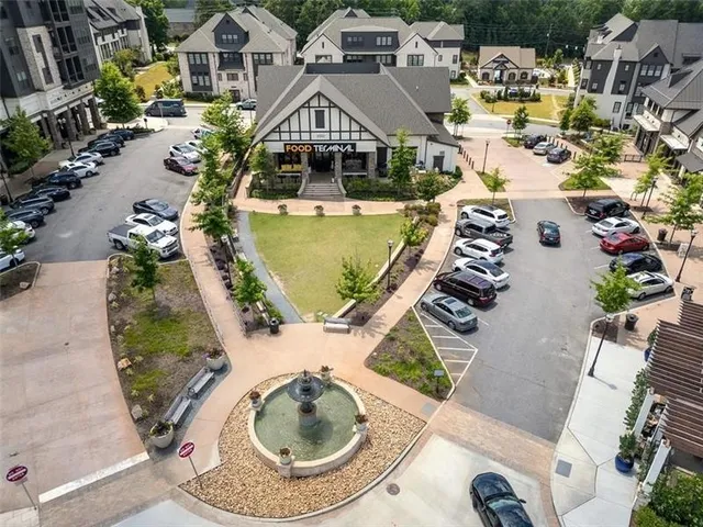 an aerial view of a house with outdoor space