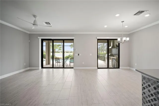 a view of large kitchen with a sink and a stove