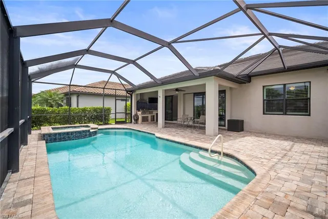 a view of a house with a swimming pool