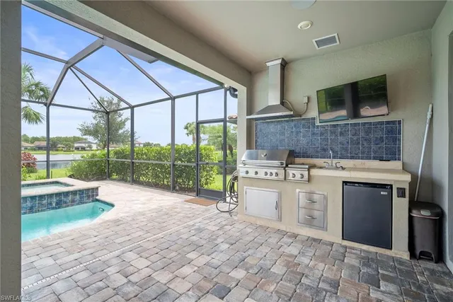 a kitchen with a stove and a microwave