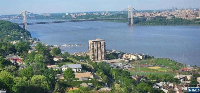 a view of a lake in middle of the town