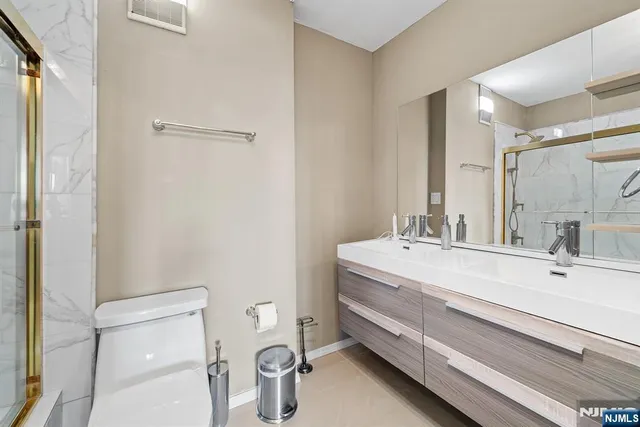 a view of a livingroom with furniture and a couch