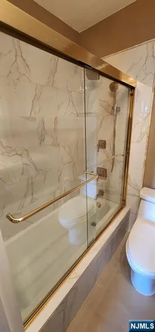 a room with pool table and a table