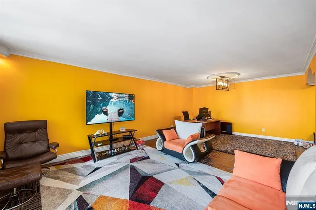 a kitchen with stainless steel appliances a sink stove and refrigerator