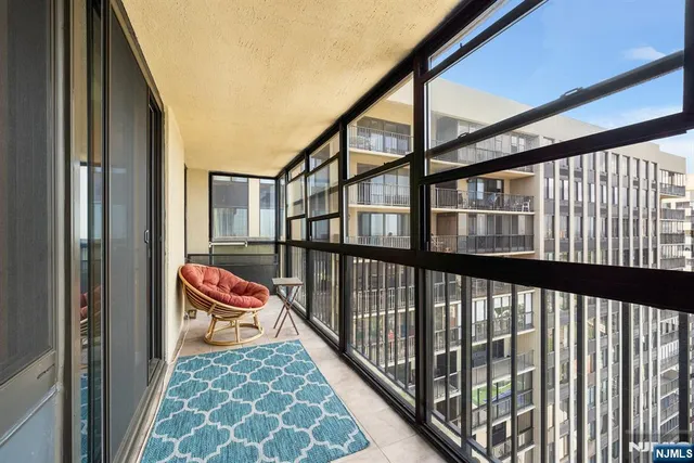 a bedroom with a bed and a table in it