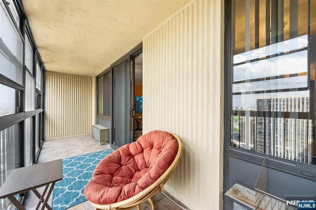 a bathroom with a sink toilet and mirror