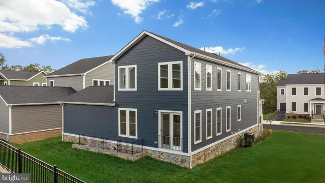 a front view of a house with yard