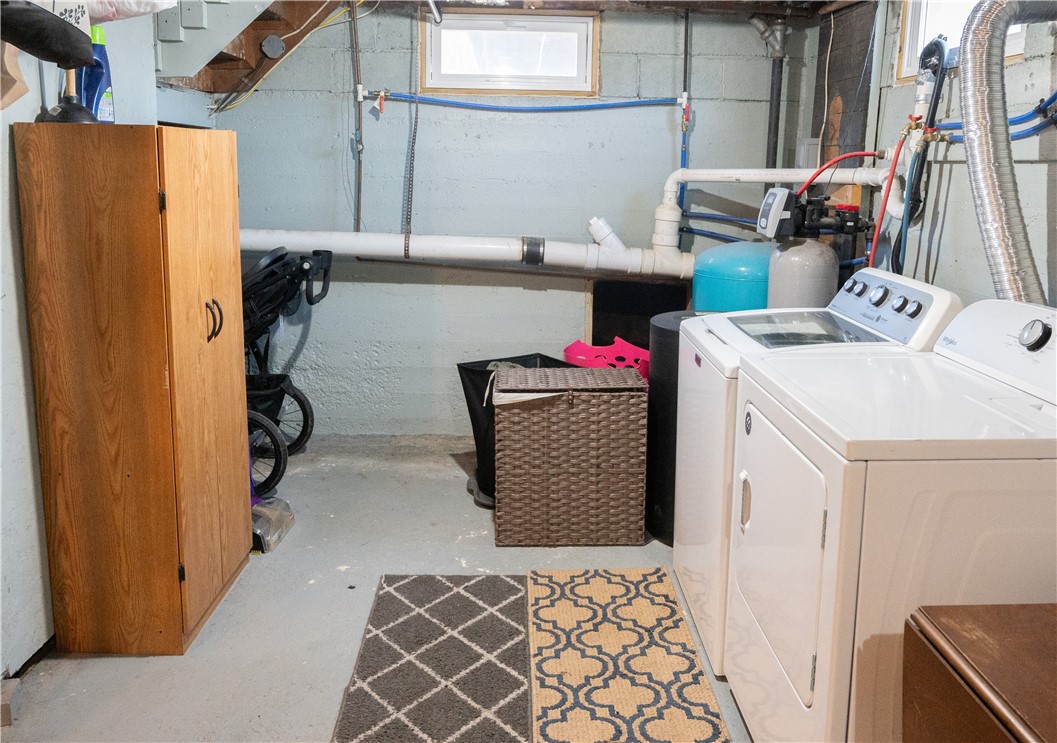 3365 Trapping Brook Road Wellsville, NY 14895 - Photo 30 of 47 The laundry area has plenty of room for the hamper, cupboard and table to fold clothing ... perfect!