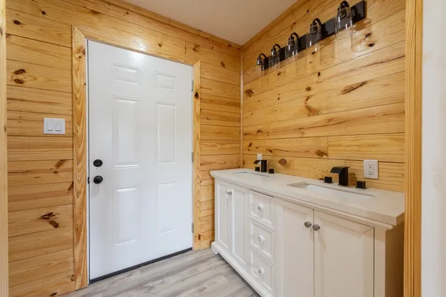 a bathroom with a sink and a shower