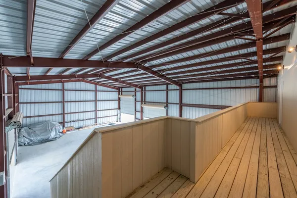 a view of empty room with staircase