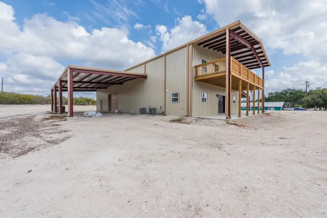 a view of a house with a garage