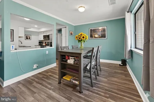 a workspace with furniture and wooden floor