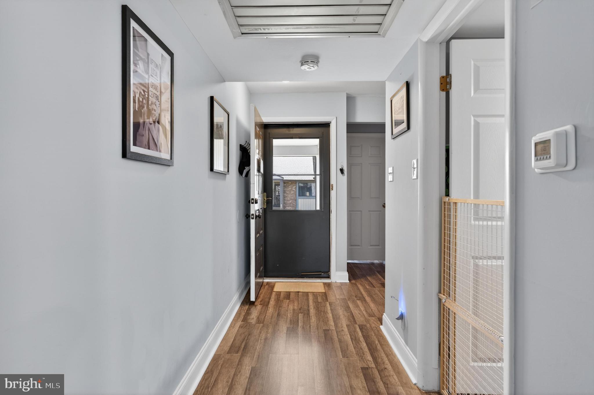 115 East Kings Highway, Unit 360 Maple Shade, NJ 08052 - Photo 2 of 20 a view of hallway with wooden floor