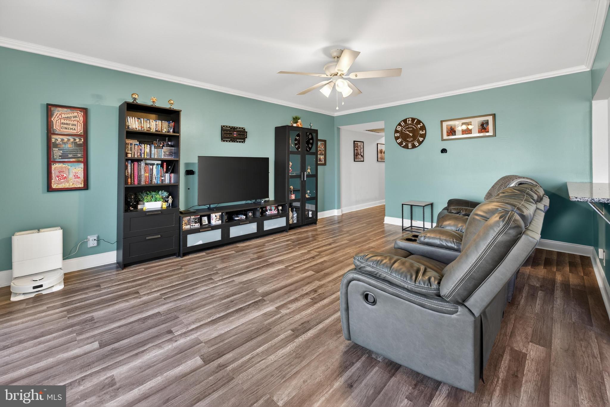 115 East Kings Highway, Unit 360 Maple Shade, NJ 08052 - Photo 7 of 20 a living room with furniture and a flat screen tv