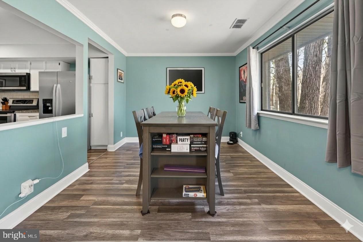 115 East Kings Highway, Unit 360 Maple Shade, NJ 08052 - Photo 9 of 20 a living room with furniture and wooden floor