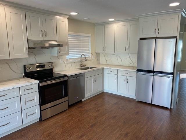 1010 Bryant Way, Unit E Sunnyvale, CA 94087 - Photo 13 of 13 a kitchen with appliances cabinets and a sink