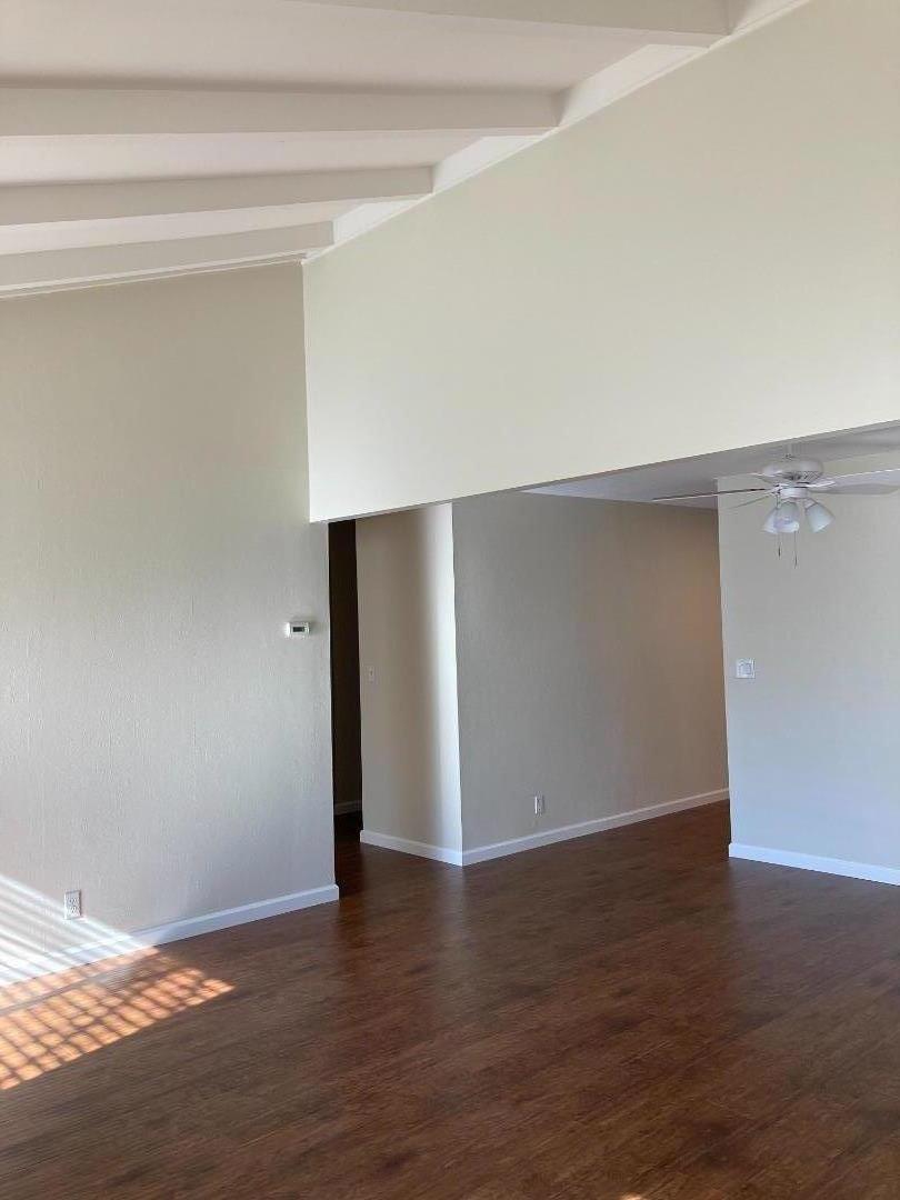1010 Bryant Way, Unit E Sunnyvale, CA 94087 - Photo 2 of 13 a view of an empty room with wooden floor