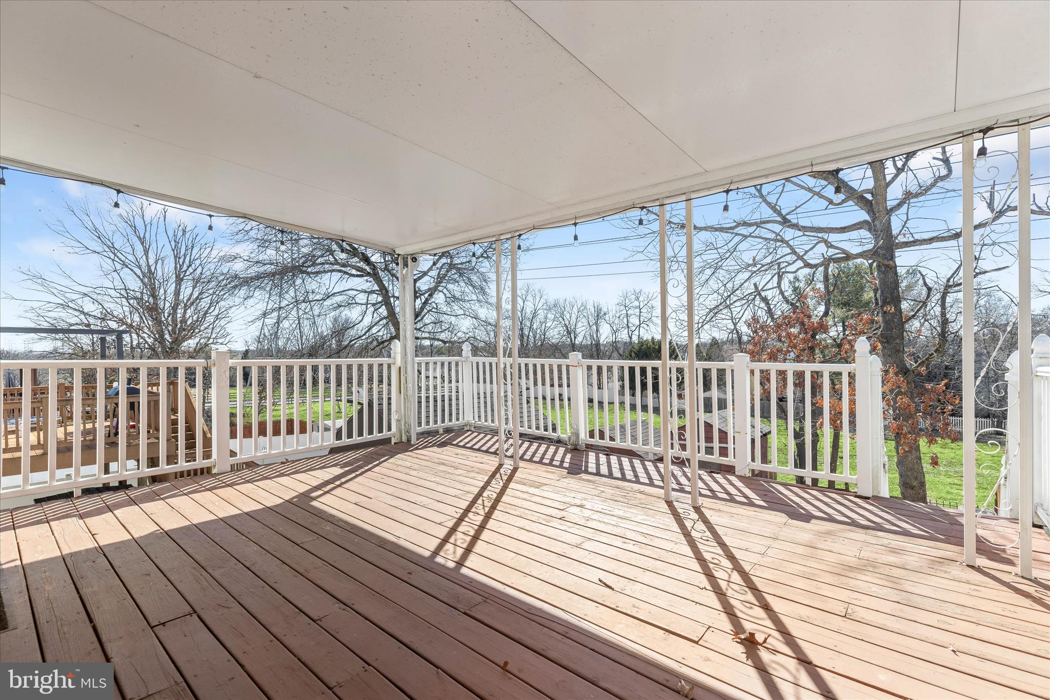 8624 Castlemill Circle Nottingham, MD 21236 - Photo 17 of 34 a balcony with wooden floor