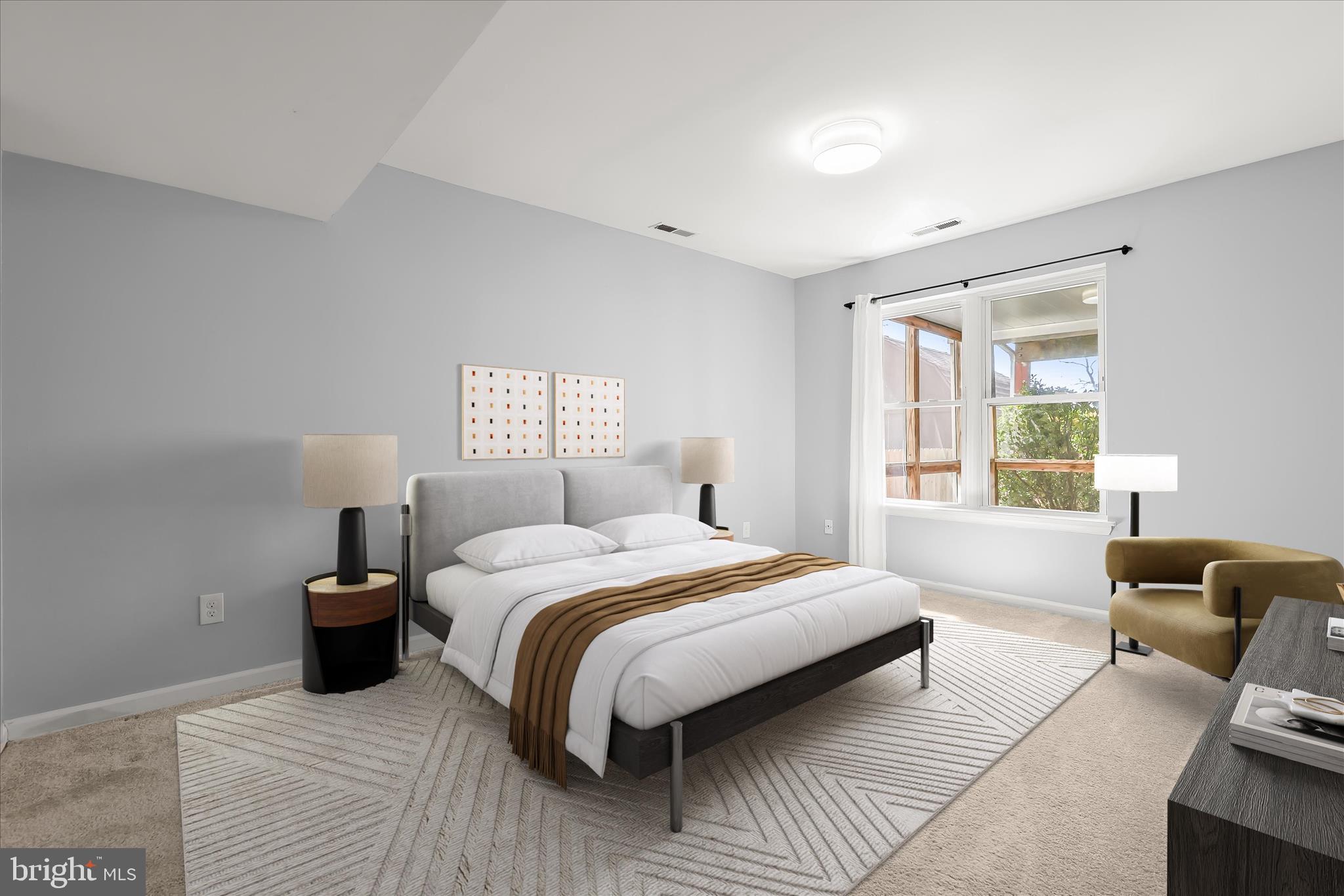 8624 Castlemill Circle Nottingham, MD 21236 - Photo 18 of 34 a bedroom with a large bed and a window