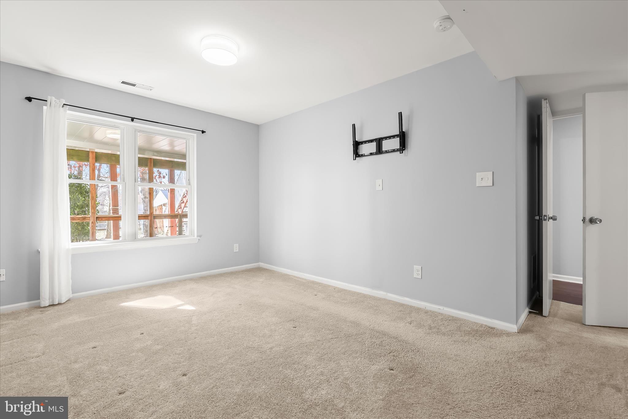 8624 Castlemill Circle Nottingham, MD 21236 - Photo 19 of 34 a view of an empty room with a window