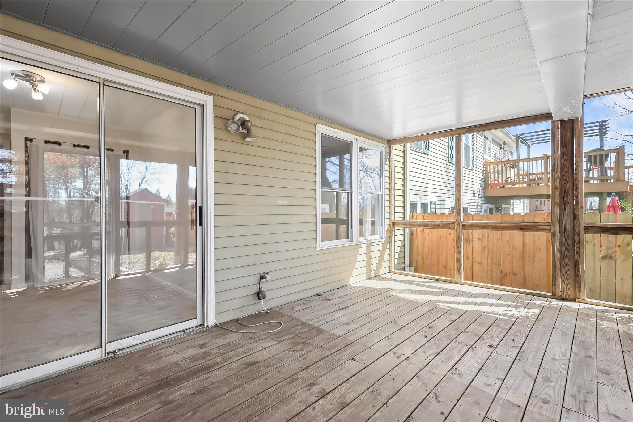 8624 Castlemill Circle Nottingham, MD 21236 - Photo 26 of 34 a view of a room with wooden floor and balcony