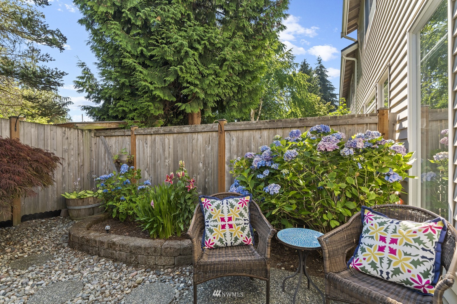 23908 Bothell Everett Highway, Unit C5 Bothell, WA 98021 - Photo 19 of 40 a wooden fence with some plants