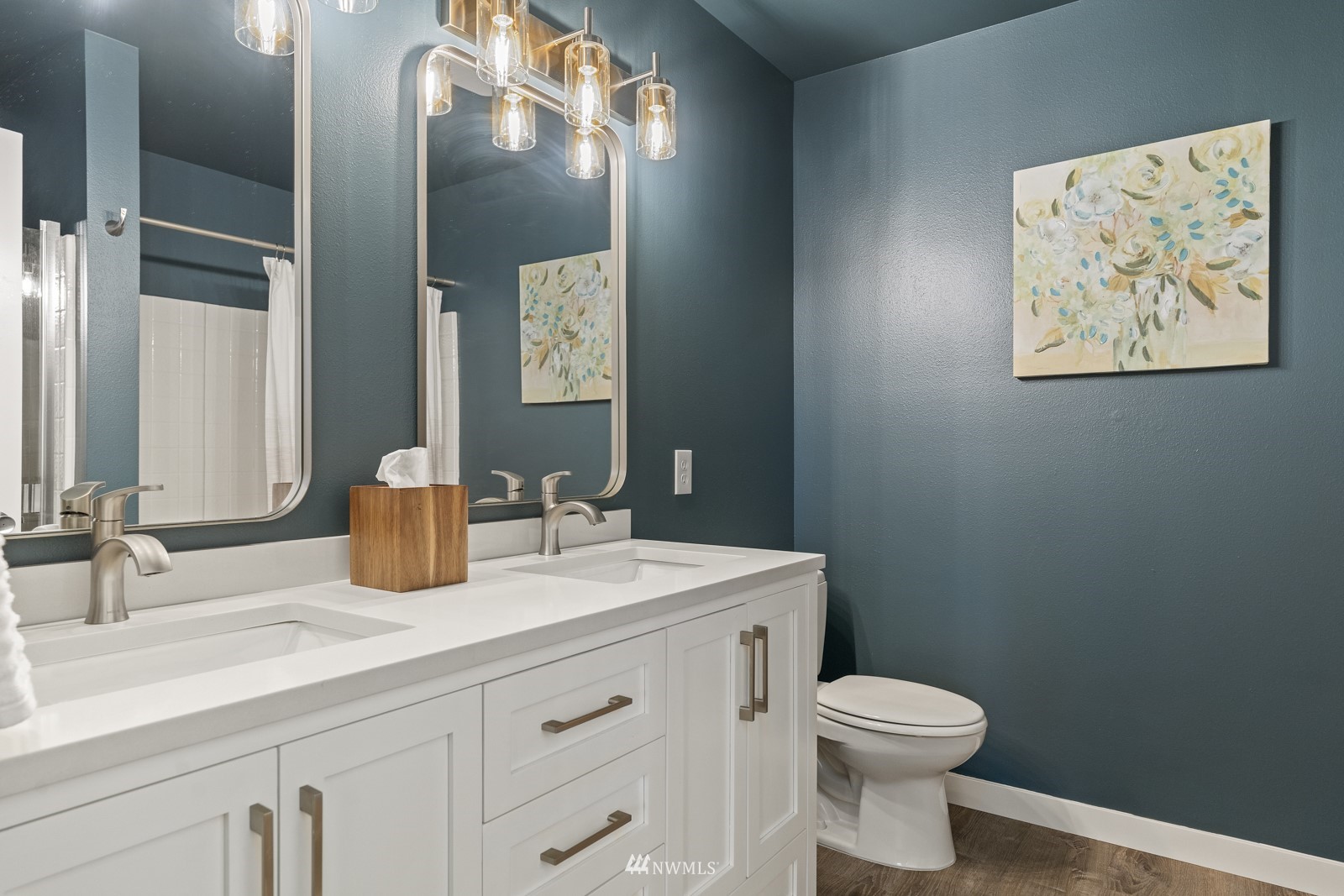23908 Bothell Everett Highway, Unit C5 Bothell, WA 98021 - Photo 28 of 40 a bathroom with a toilet sink and mirror