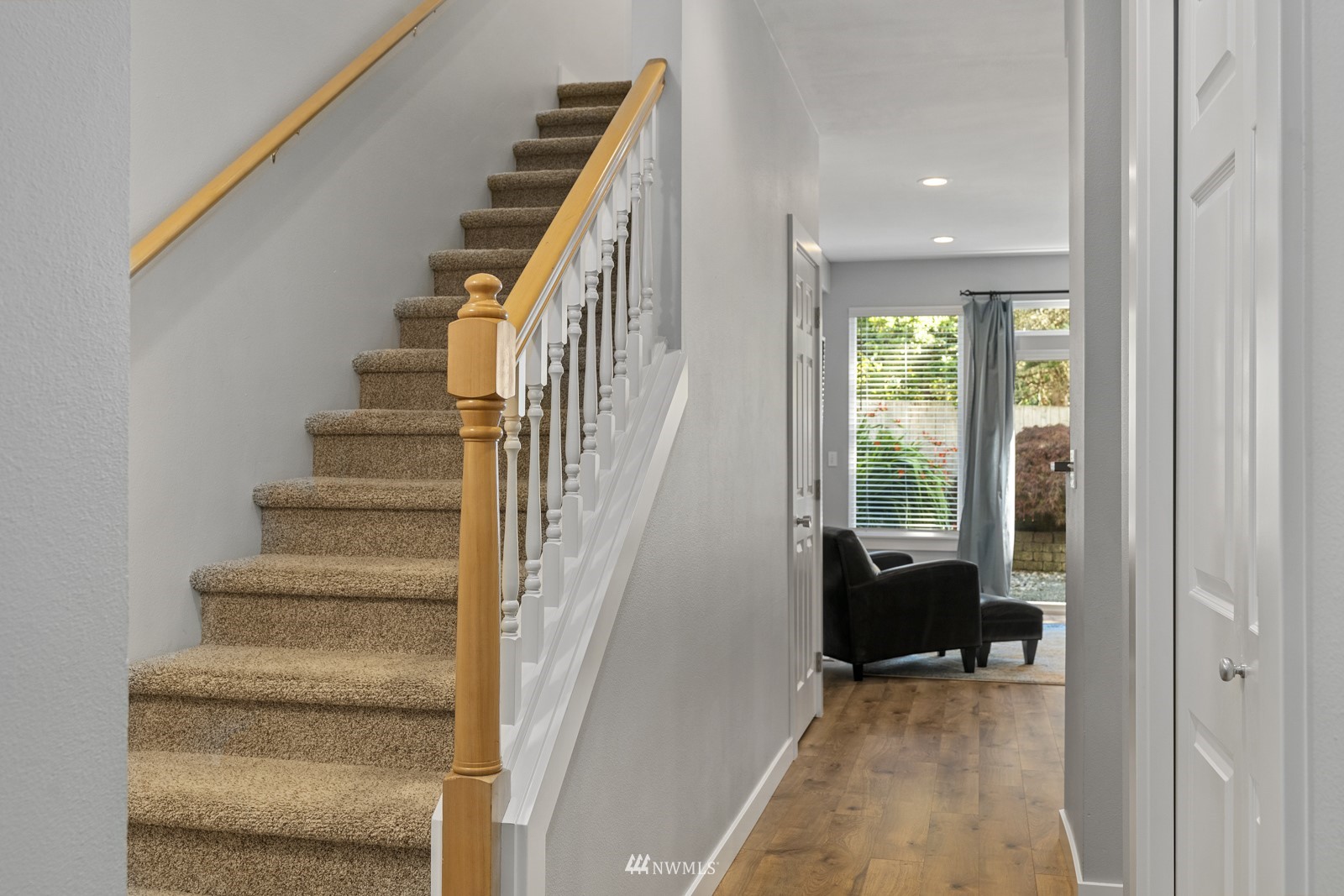 23908 Bothell Everett Highway, Unit C5 Bothell, WA 98021 - Photo 5 of 40 a view of entryway and hall with wooden floor