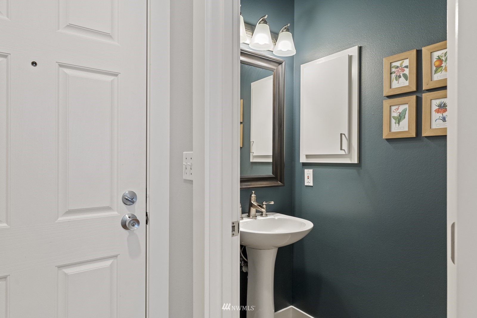 23908 Bothell Everett Highway, Unit C5 Bothell, WA 98021 - Photo 6 of 40 a bathroom with a sink and mirror