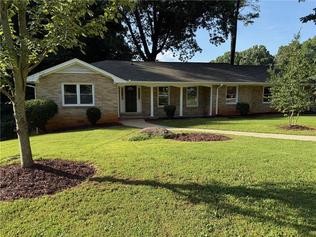 2545 Glenrock Drive Decatur, GA 30032 - Photo 1 of 1 a front view of a house with garden