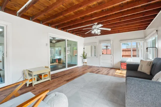 a bathroom with a double vanity sink a toilet and a mirror
