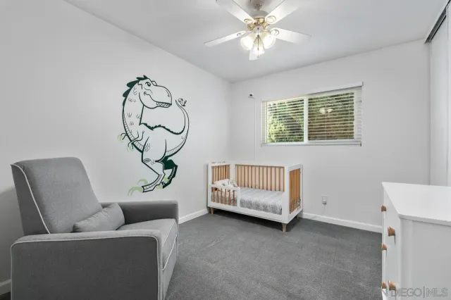 a view of backyard with a garden and plants