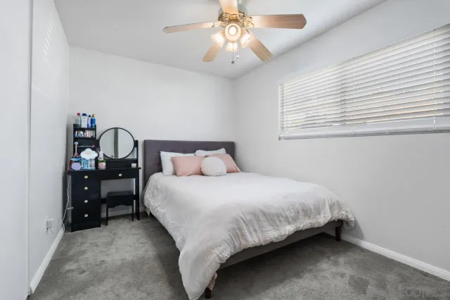 a front view of house with yard and outdoor seating